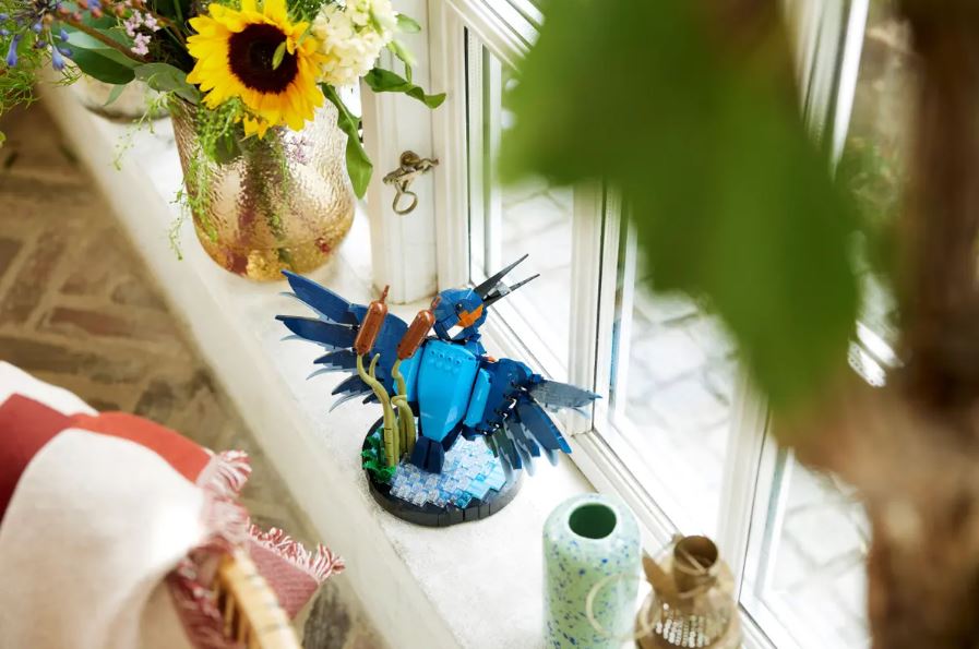 Lego icons Kingfisher playset placed on a window ledger
