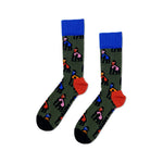 A pair of dark green crew socks with gorilla illustration print in bold colours.